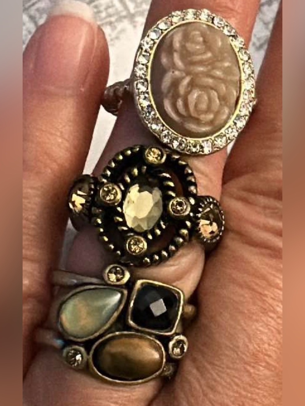 As a set: Lia Sophia rings size 6. No stones missing!!